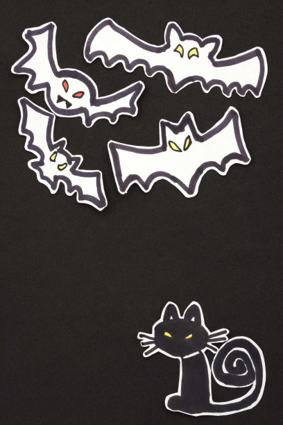万圣节装饰猫和蝙蝠垂直图片下载