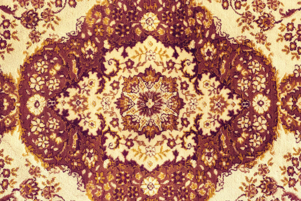 波斯地毯。特写民族流行古色古香的东方背景，唯美艺术，质感。抽象的重复设计红蓝色花在黄色风格的背景墙纸纹理。图片下载