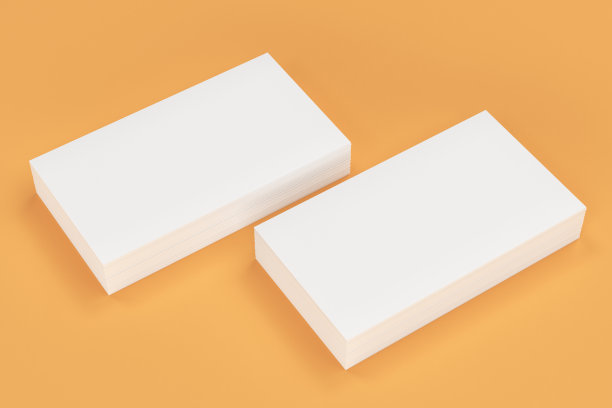 白色空白名片模型上的橙色背景图片下载