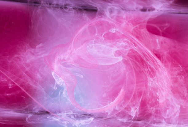 抽象的彩色背景。粉色的烟，水墨的水，宇宙的图案。抽象的运动，凝固的多色流动的绘画。水平照片与软焦点，模糊的背景图片下载