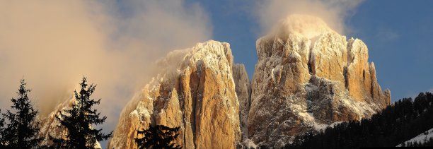 从Campitello di Fassa滑雪场在Canazei的Sassolungo (Langkofel)群的意大利白云石在冬天。图片下载