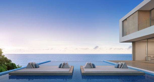 现代设计的豪华海滨别墅，海景游泳池，大家庭度假之家素材图片
