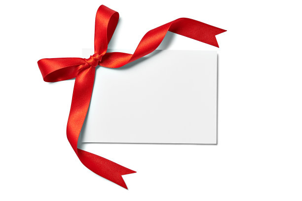 彩带蝴蝶结卡片的圣诞庆祝问候素材图片