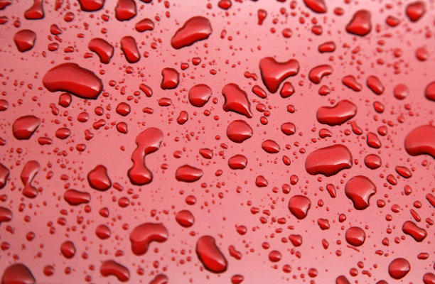 玻璃背景上的雨滴图片下载