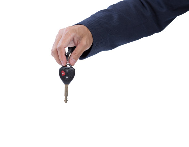 商人手持汽车遥控器图片下载