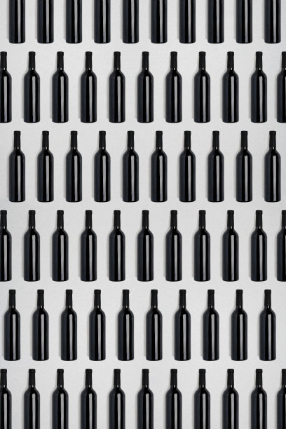 黑暗的酒瓶。创造性的黑色和纹理抽象背景素材图片