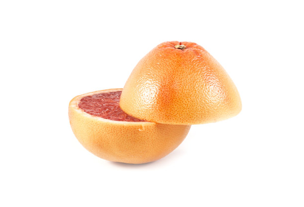 切好的两半葡萄柚分开放在白色的上图片下载