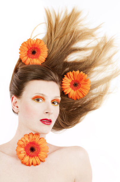 美丽的照片与橙色的化妆和非洲菊图片下载