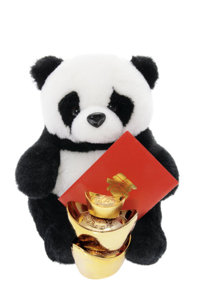 带中国新年装饰的熊猫毛绒玩具素材图片