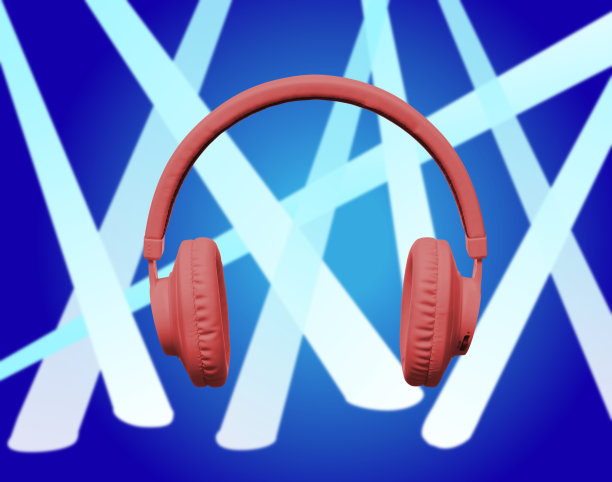 蓝色聚光灯下的红色耳机图片下载