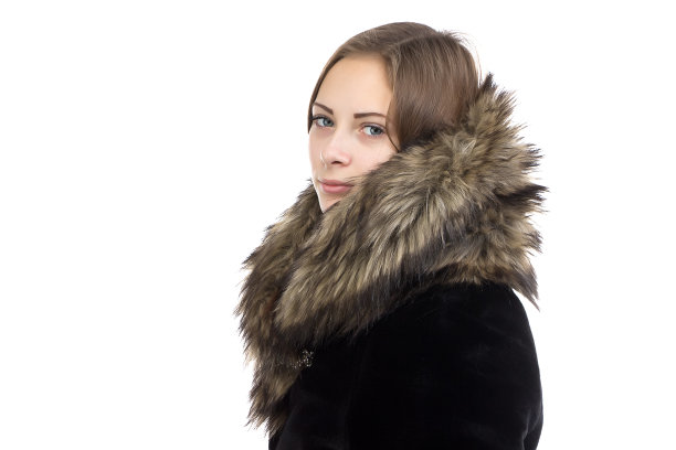 一个穿着冬季大衣的可爱女人的形象图片下载