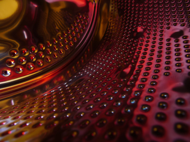 浅色不锈钢洗涤机滚筒。图片下载