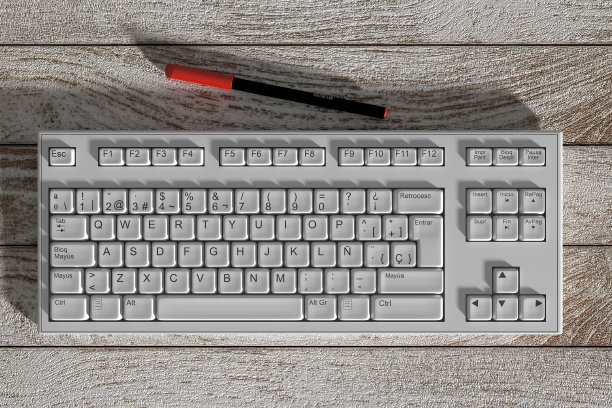 白色西班牙键盘和红色记号笔在木桌上图片下载