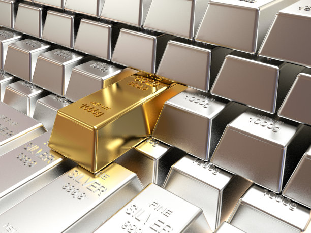 一堆堆的银条和一块金子。图片下载
