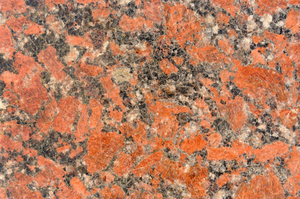 斑驳的黑色和红色花岗岩纹理图片下载
