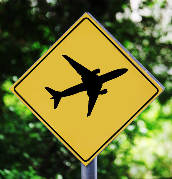 黄色交通标志与飞机象形文字图片下载