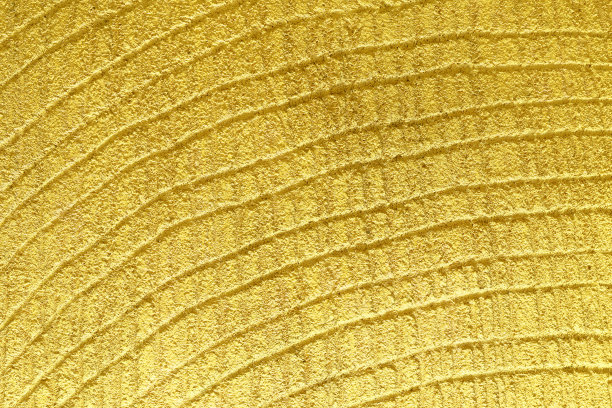 黄色装饰浮雕石膏在墙上特写图片下载