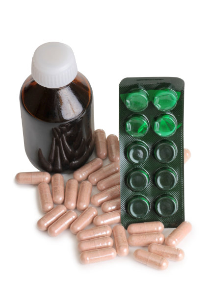 药丸和银行在白色的背景图片下载