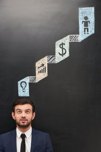 商人和彩色的符号画在黑板上图片下载