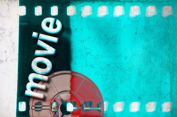 复古蓝色薄膜带框架与线圈和“电影”字。图片下载