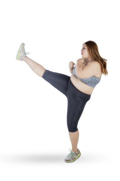 超重的女人踢着复印空间图片下载