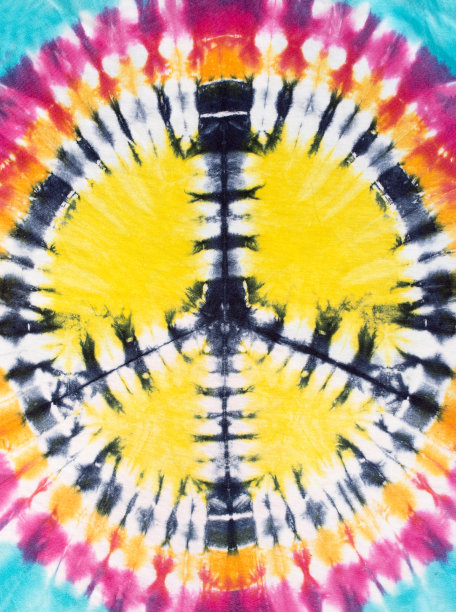 和平标志扎染图案背景。素材图片