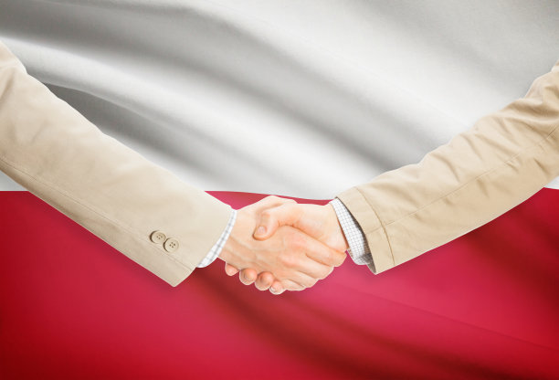 商人握手的背景国旗-波兰图片下载