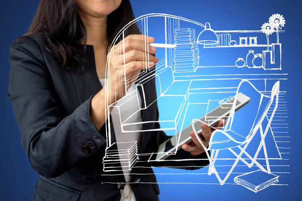 商业女性(建筑师/室内设计师)与虚拟家庭绘图图片下载