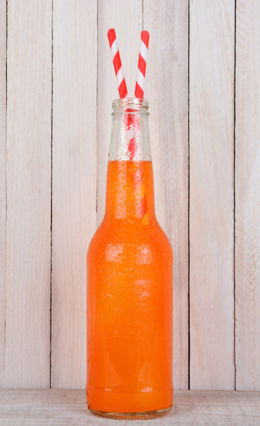 两根吸管的橙汁汽水图片下载