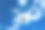 无人机在海上飞行。白色的无人机在湛蓝的天空中盘旋素材图片