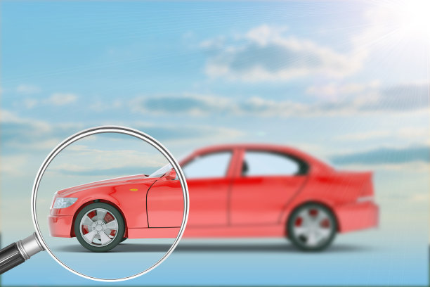 放大镜下的红色汽车图片下载