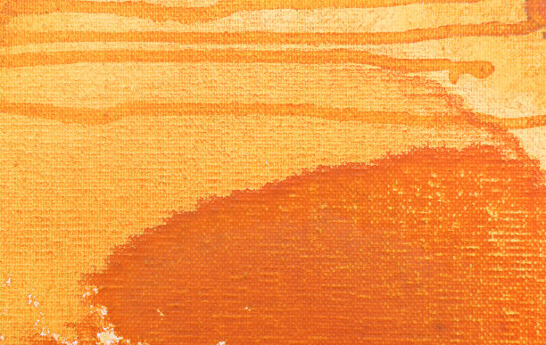 抽象艺术背景。画布上的橙色丙烯酸染料。温暖的颜色。图片下载