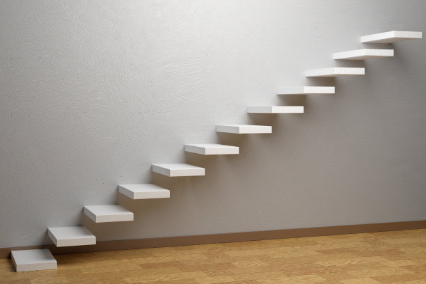 在带镶木地板的空房间里，楼梯的上升楼梯图片下载