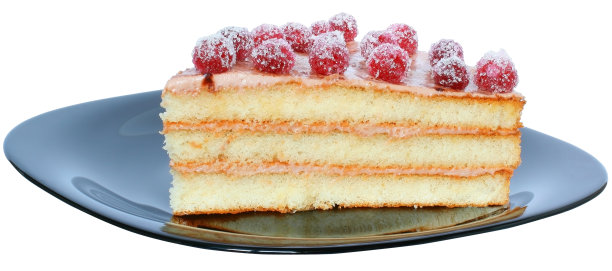 一块分层的蛋糕放在一个黑色盘子上图片下载