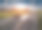 两辆孤独的卡车在田园诗般的阳光明媚的早晨行驶在高速公路上图片下载