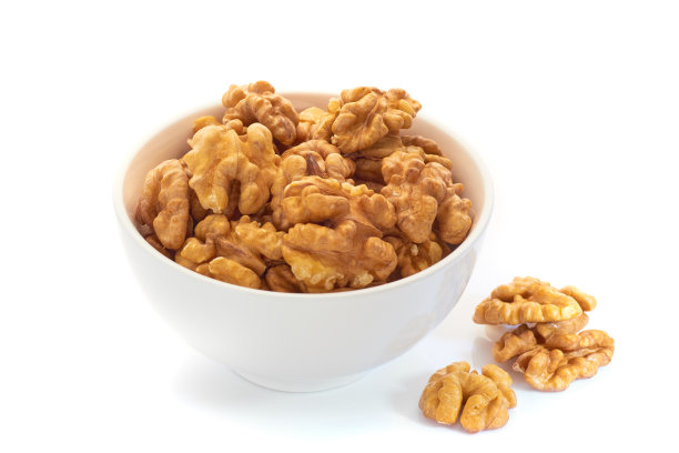 核桃在白色的碗上图片下载