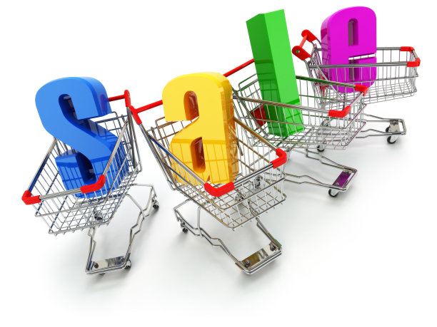 销售的概念。购物车与文本隔离在白色。图片下载