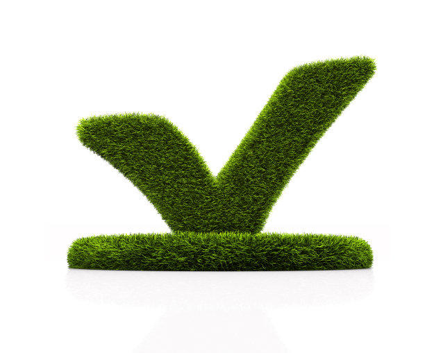 绿草勾号符号在白色的圆圈上图片下载