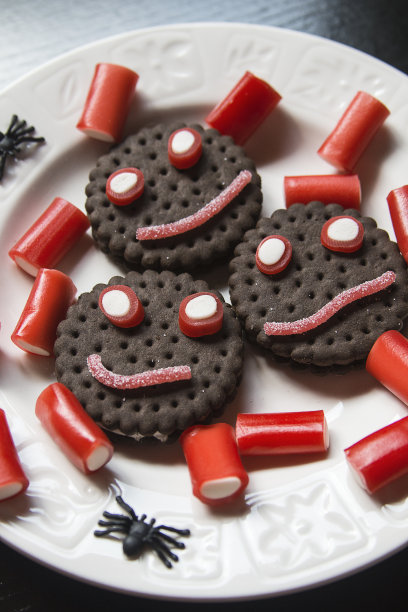 微笑饼干糖果和蜘蛛在万圣节的节日图片下载