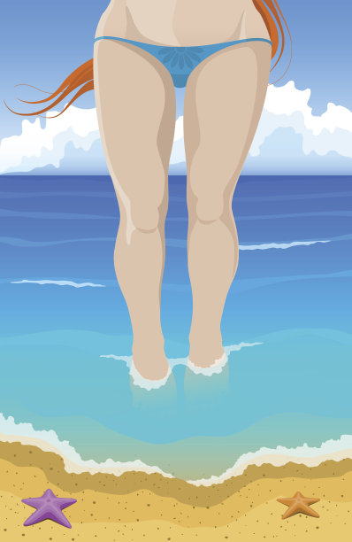 穿着比基尼的红发女孩在海滩上图片下载