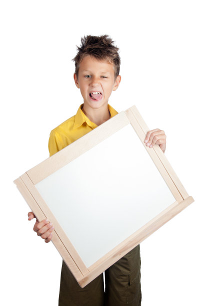 可爱的男孩拿着白板图片下载