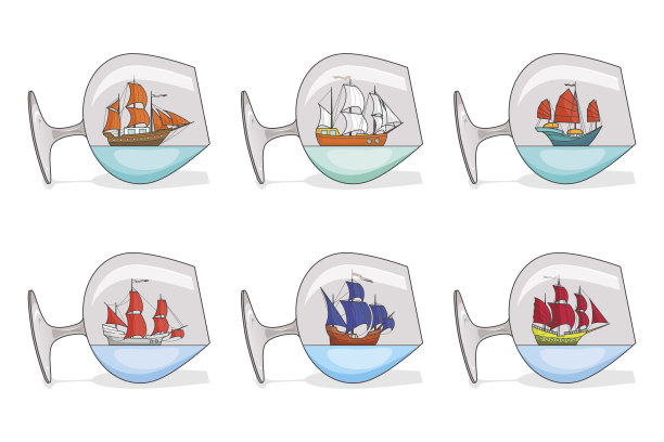 一套彩色的船，玻璃帆。纪念品与帆船孤立在白色背景的旅行，旅游，旅行社，酒店。图片下载