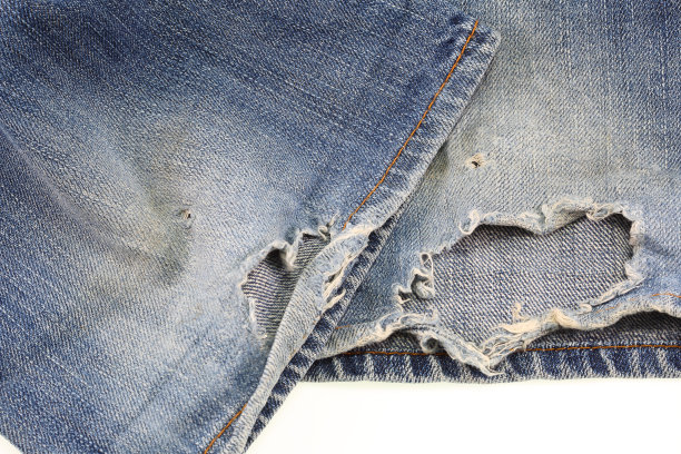 破旧的蓝色牛仔裤图片下载