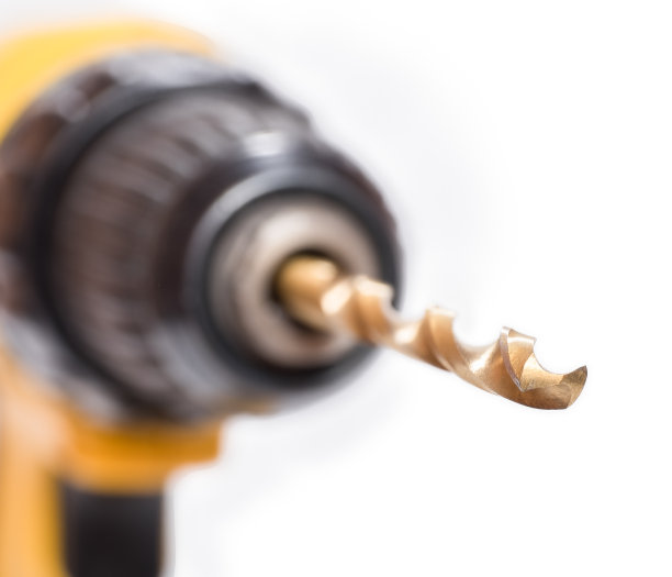 带钻头的黄色钻头。图片下载