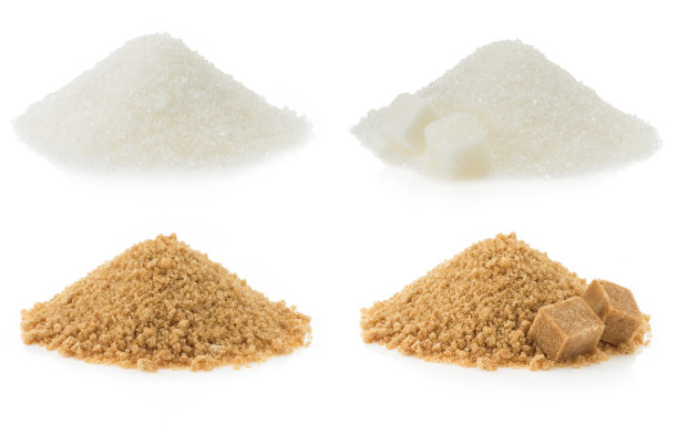 糖堆在白色的东西上素材图片