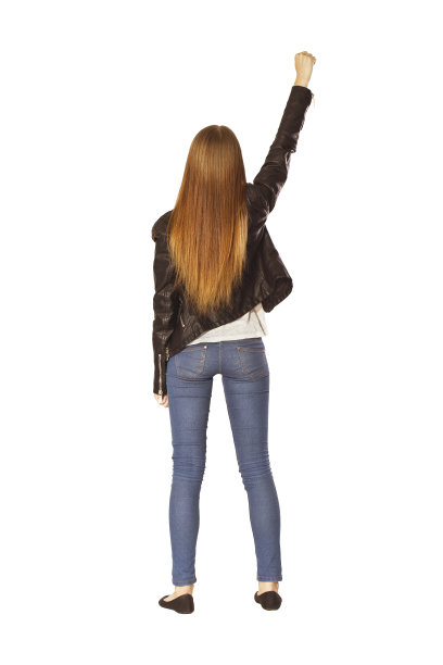 女人与胜利手势背后的肖像。图片下载