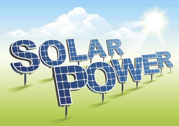 太阳能。绿地上的太阳能电池板图片下载