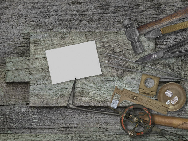 老式的珠宝工具，挂在木凳上的名片图片下载