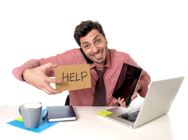 超负荷工作的商人，工作压力大，寻求帮助图片下载