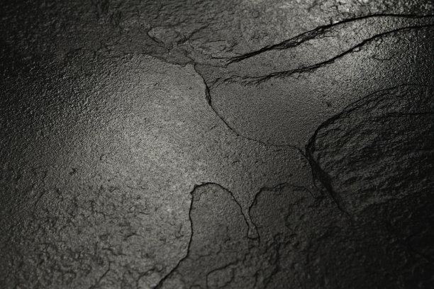 黑色石材纹理背景。图片下载